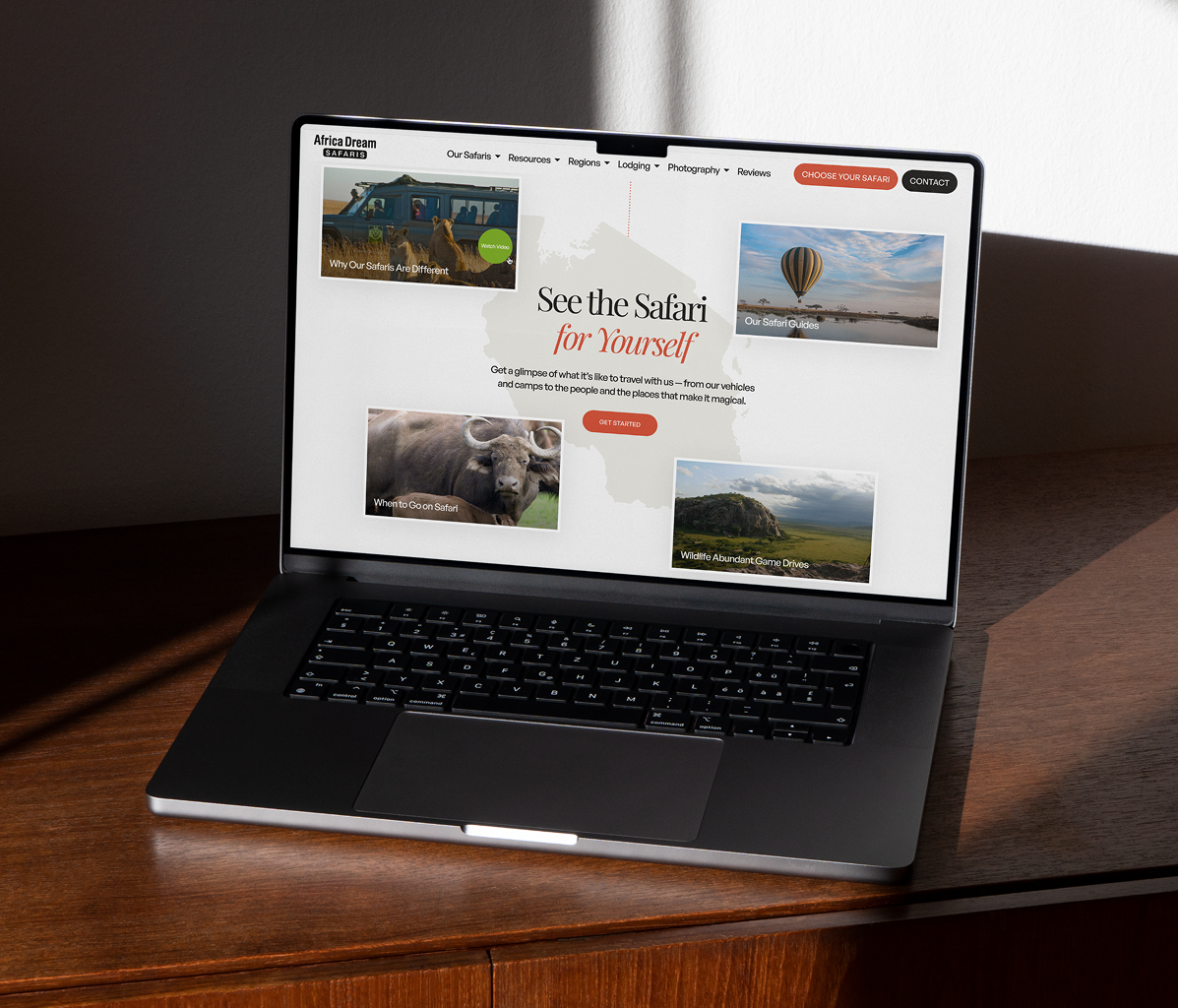 Africa Dream Safaris photography gallery page on laptop