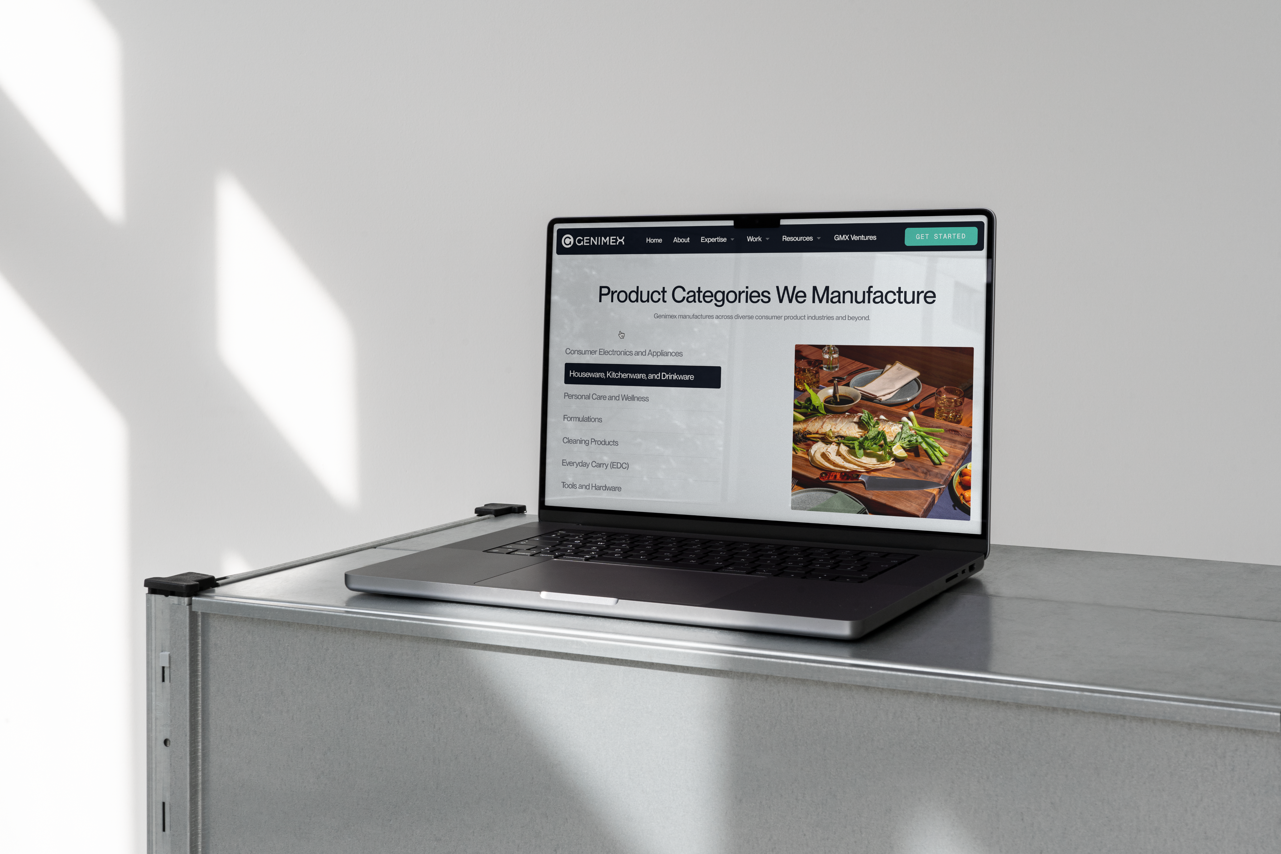 Genimex product categories page on laptop